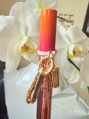 Tarte Lip Gloss in Bold Orange and Pink
